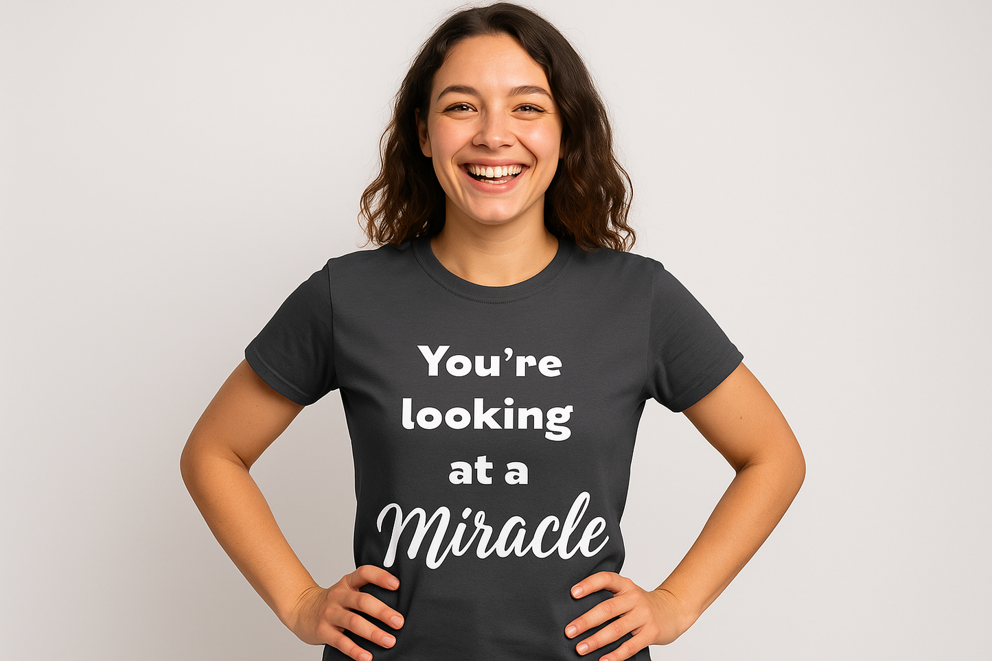 Female model wearing dark gray miracle shirt