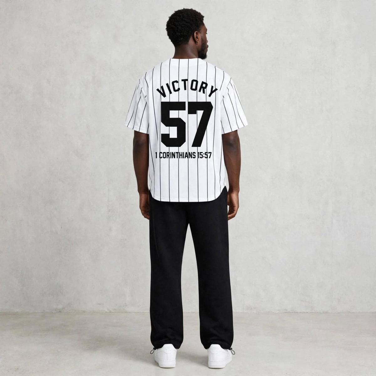 Victory jersey by Kingdom Mind Apparel featuring bold design and comfortable fit, displayed on a hanger.