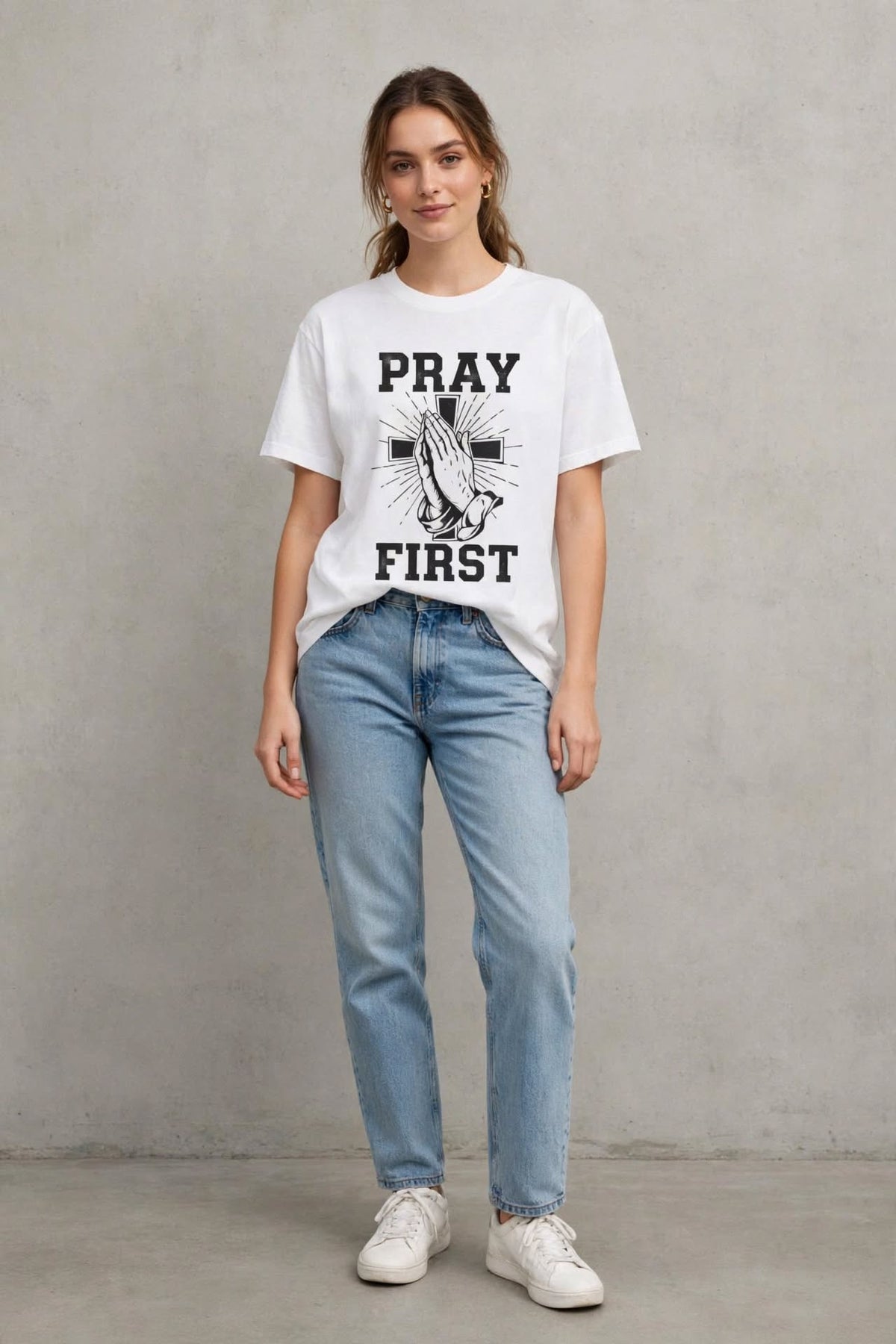 White Pray First T-shirt by Kingdom Mind Apparel featuring a simple, clean design with the "Pray First" message.