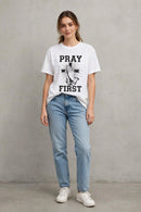 White Pray First T-shirt by Kingdom Mind Apparel featuring a simple, clean design with the "Pray First" message.
