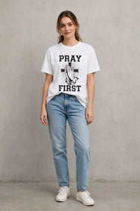 White Pray First T-shirt by Kingdom Mind Apparel featuring a simple, clean design with the "Pray First" message.