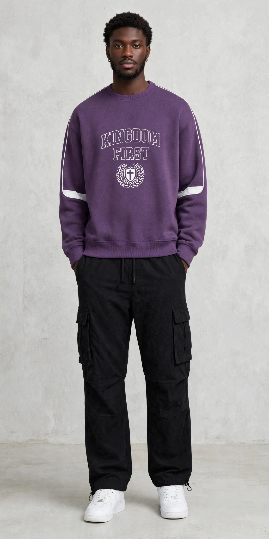 Kingdom First Crewneck Sweatshirt by Kingdom Mind Apparel, showing a cozy, black sweatshirt with the brand logo on the chest.
