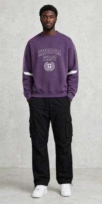 Kingdom First Crewneck Sweatshirt by Kingdom Mind Apparel, showing a cozy, black sweatshirt with the brand logo on the chest.