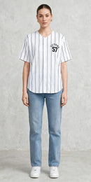 Victory jersey with vertical black stripes, short sleeves, and "Victory 57" logo on the front, worn with light blue jeans and white sneakers.