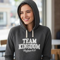 Close-up female model wearing Team Kingdom hoodie