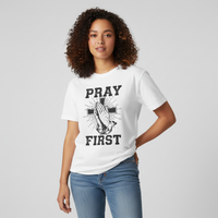 Female model wearing Pray First White Tee