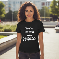 Female wearing You're looking at a miracle t-shirt