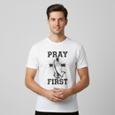 Male model wearing Pray First White Tee